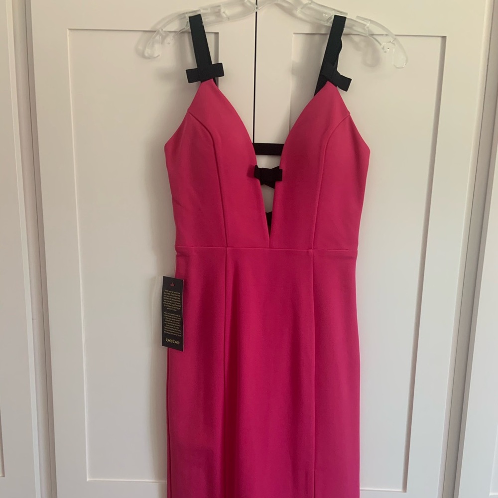 Bebe hot pink and black body conscious dress in size small, new with tags